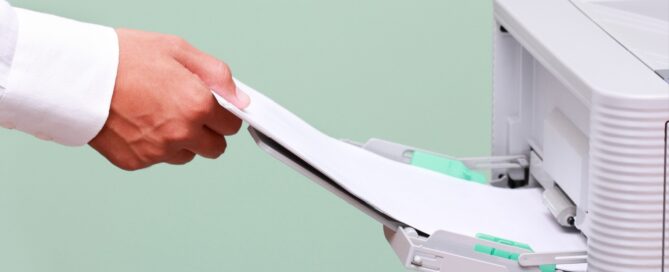 is it cheaper to buy or lease a copier?